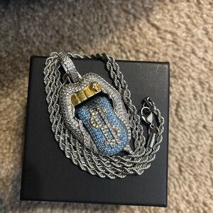 Silver and Gold Pendant Necklace with Blue Accents